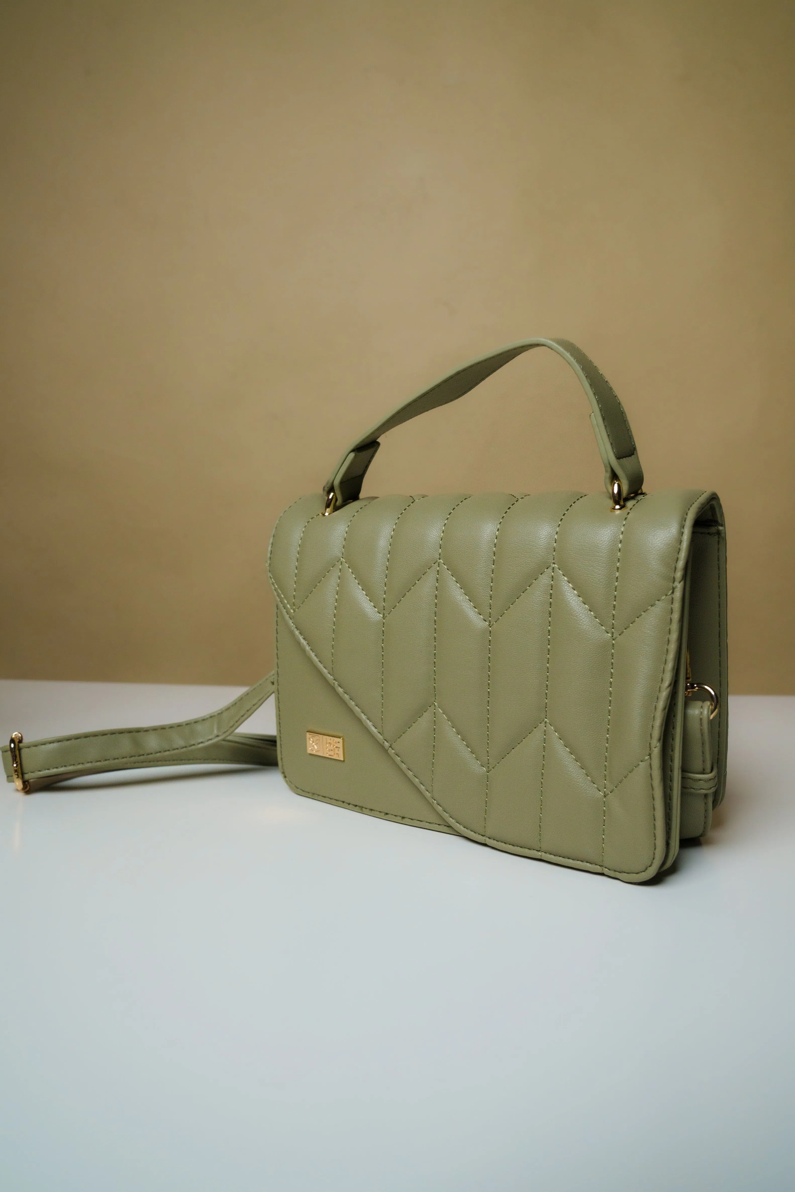 OLIVE ARROW QUILT CROSS-BODY BAG