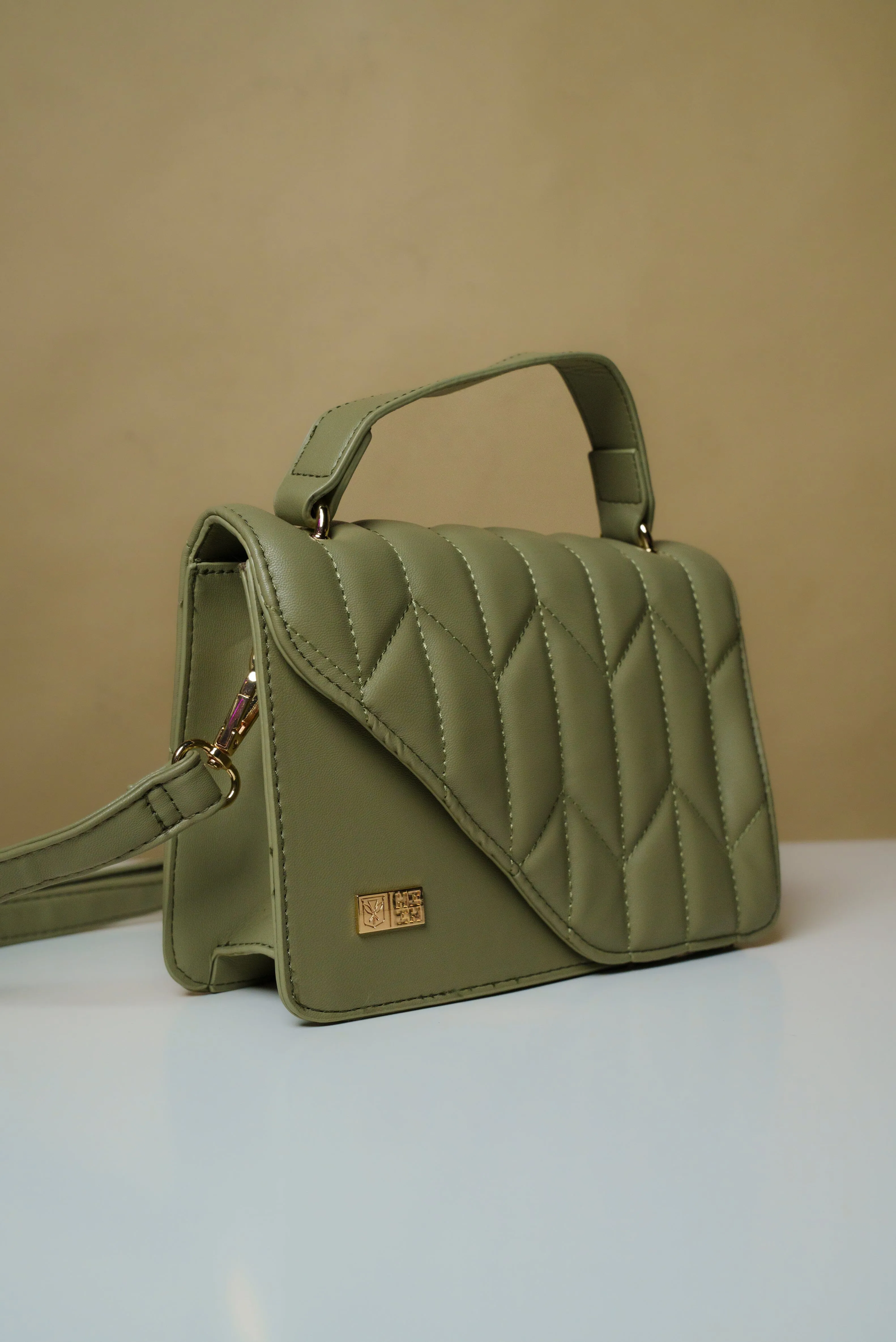 OLIVE ARROW QUILT CROSS-BODY BAG