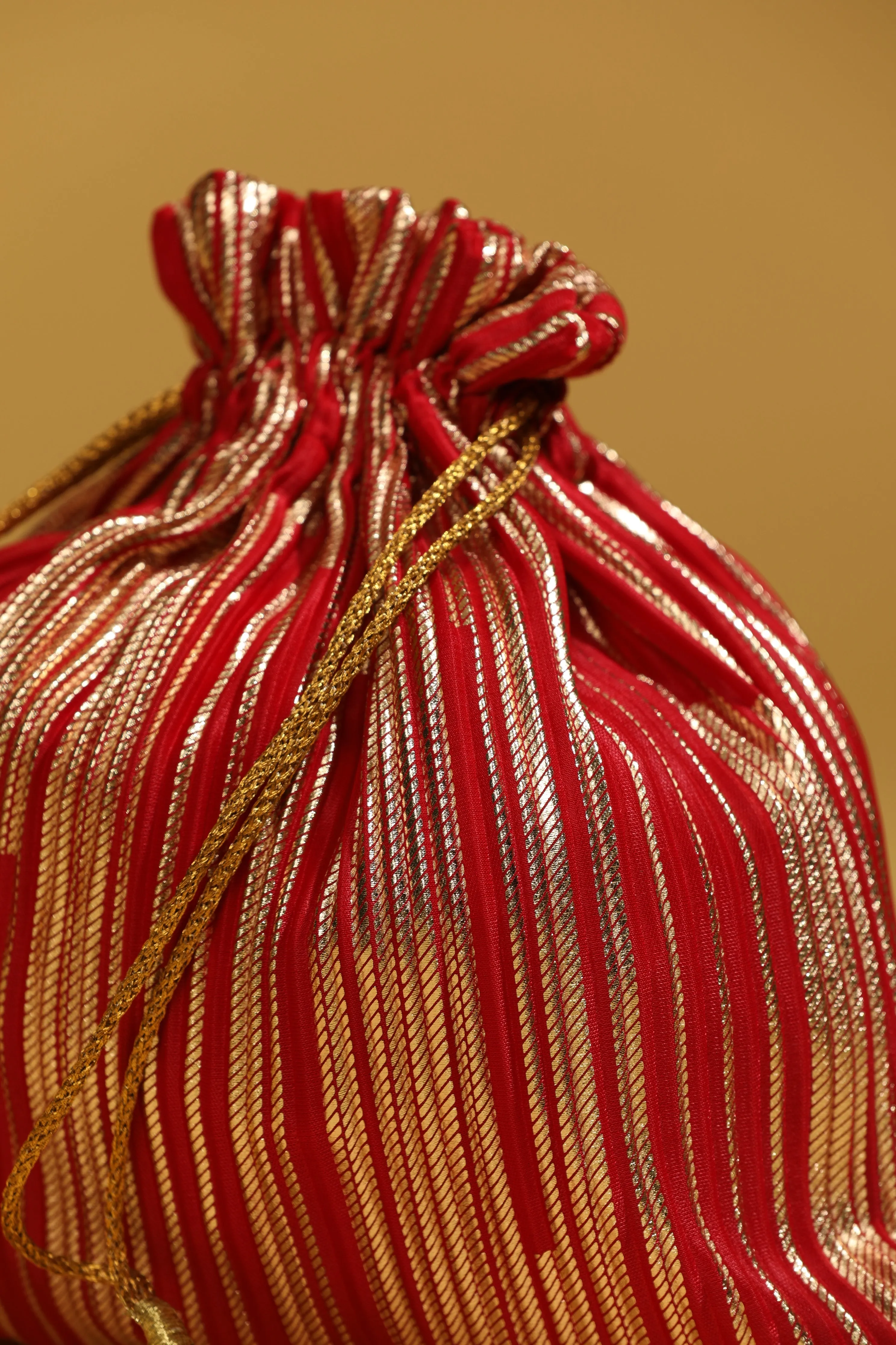 Red Bead Work Potli Bag with Sequin Detailing and Long Tassels